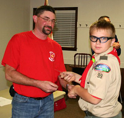 Zachary Arp receives his Tenderfoot badge.