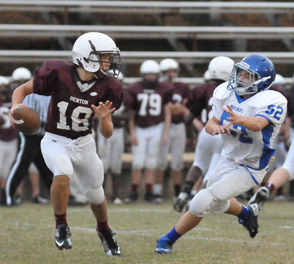 Bryant White's Joe Small (52) tracks Benton quarterback Prestone Stone. (Photo by Kevin Nagle)