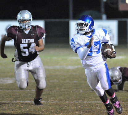 Bryant's Savonte Turner (37) heads upfield as Benton's Bill Williams pursues. (Photo by Kevin Nagle)