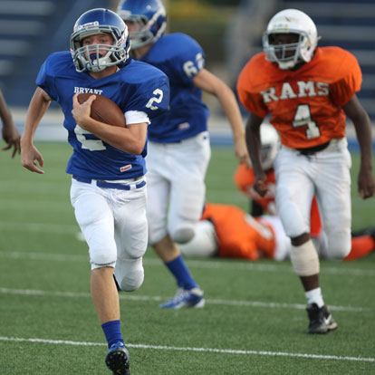 Jake East (2) heads up the sideline with the second-half kickoff he returned 84 yards for a touchdown. (Photo by Rick Nation)