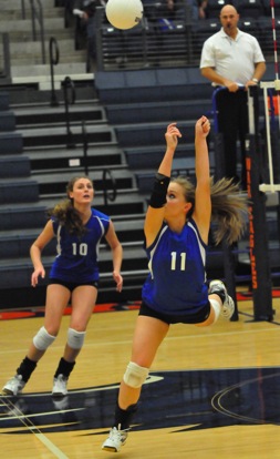 Hannah Rice makes a save in front of teammate Alyssa Anderson. (Photo by Kevin Nagle)