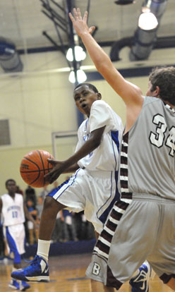 Bryant's Alex Oneal takes it to the rack. (Photo by Rick Nation)