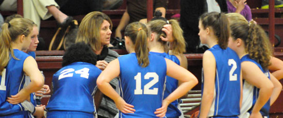 Bryant Blue coach Rhonda Hall instructs during a timeout. (Photo by Kevin Nagle)