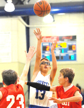 Brandon Hill takes a shot for Bryant White. (Photo by Kevin Nagle)