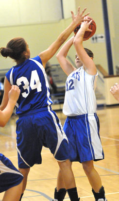 Sarah Kennedy (12) looks for room to get a shot away. (Photo by Kevin Nagle)