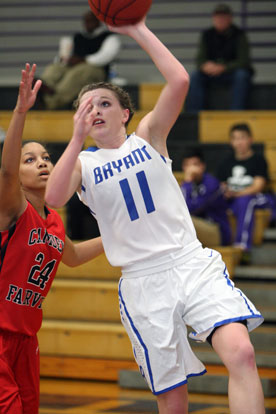 Logan Davis drives past a Camden defender. (Photo by Rick Nation)