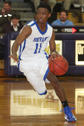 Strodney Davis works the ball to the left wing. (Photo by Rick Nation)