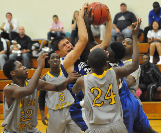 Bryant's Clay Ingold and Kameron Guillary fight for a rebound in the midst of a group of Watson Chapel players. (Photo by Kevin Nagle)