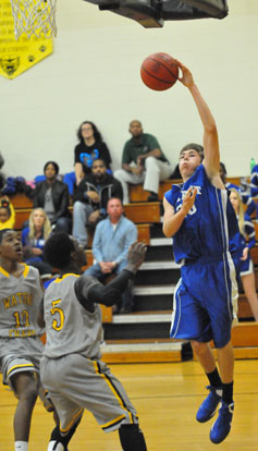 Evan Lee puts up a jump hook from the left baseline. (Photo by Kevin Nagle)