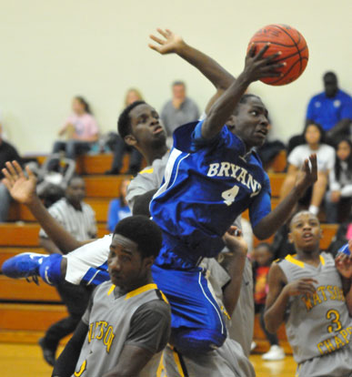 Simeon Rice attacks the basket, slicing through the Watson Chapel defense. (Photo by Kevin Nagle)