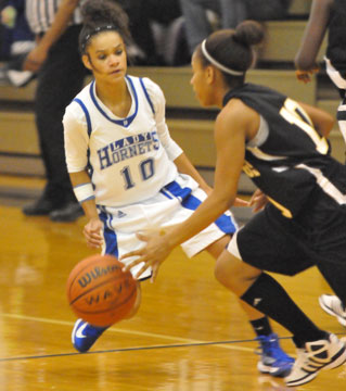 AnneMarie Keith (10) defends against a drive. (Photo by Kevin Nagle)