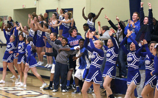 The Bryant freshman cheering section celebrates Kailey Nagle's shot with :10 left to play. (Photo by Rick Nation)