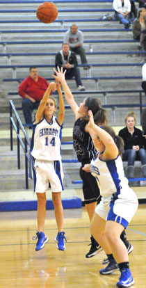 Anna Lowery fires a shot from the baseline. (Photo by Kevin Nagle)