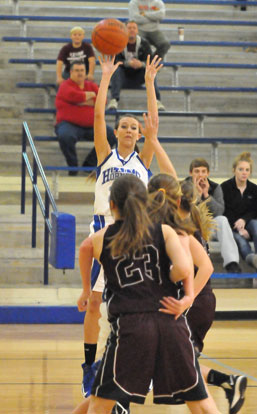 Kailey Nagle shoots over a pair of Benton defenders. (Photo by Kevin Nagle)