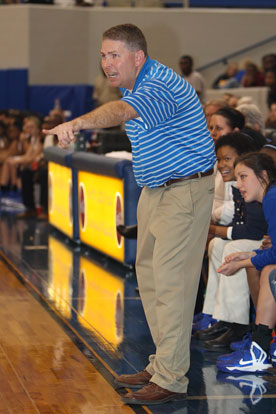 Bryant coach Brad Matthews directs traffic during Thursday's game. (Photo by Rick Nation)