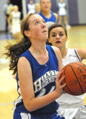 Bryant's Britney Sahlmann drives to the hoop. (Photo by Kevin Nagle)