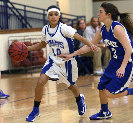 Bryant AnneMarie Keith (10) is chased by Conway Blue's Brooklyn Smith. (Photo by Rick Nation)