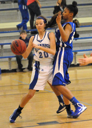 Kailey Nagle (20) tries to get free as Conway Blue's Charlena Green gives her bump. (Photo by Kevin Nagle)
