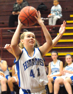 Hailey Gentry eyes the basket. (Photo by Kevin Nagle)