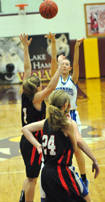 Kailey Nagle launches a 3-point shot over a Malvern defender. (Photo by Kevin Nagle)