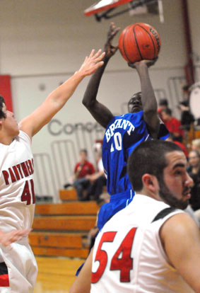 Kevin Hunt gets a jumper away. (Photo by Kevin Nagle)