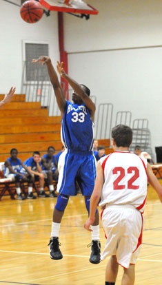 Romen Martin (33) fires up a shot. (Photo by Kevin Nagle)