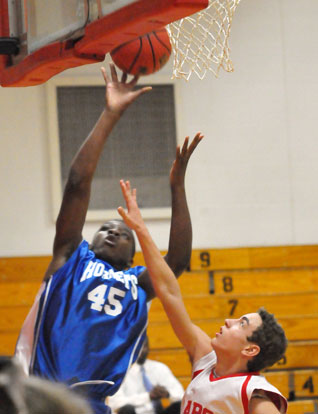 John Winston releases a layup. (Photo by Kevin Nagle)