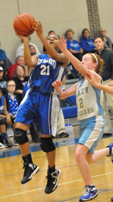 Destiny Martin goes up for a shot. (Photo by Kevin Nagle)