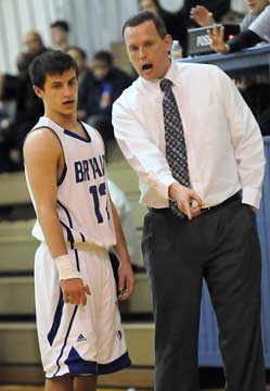 Bryant coach Mike Abrahamson points something out to senior guard Brantley Cozart. (Photo by Kevin Nagle)