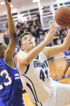 Zach Cambron (44) gets inside of Conway's Justin Leon for a shot. (Photo by Kevin Nagle)