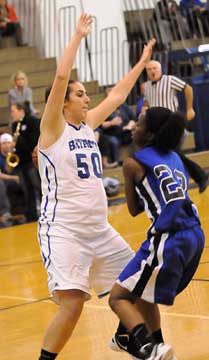 Bryan's Whitney Meyer (50) defends against Conway's Claire Hobbs. (Photo by Kevin Nagle)