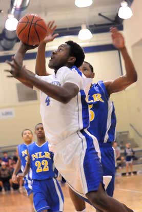 K.J. Hill's shot is contested by North Little Rock's Kevaughn Allen. (Photo by Kevin Nagle)