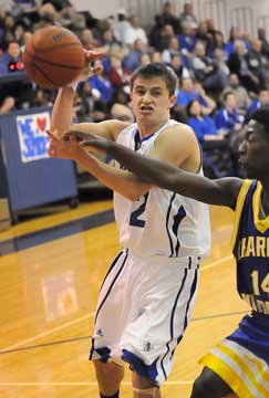 Brantley Cozart (12) gets the ball knocked loose. (Photo by Kevin Nagle)