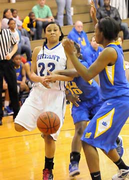 Kiara Moore (22) gets the ball stripped away from her. (Photo by Kevin Nagle)