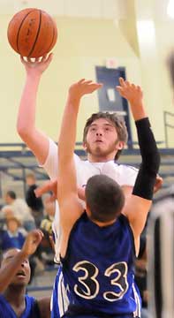 Bryant's Ryan Hall goes up for a shot over Conway Blue's Grant Ellis (33). (Photo by Kevin Nagle)