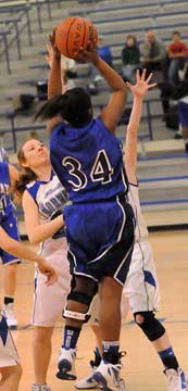 Bryant's Kierra Solinger, left, defends Conway Blue's Deana Ester. (Photo by Kevin Nagle)