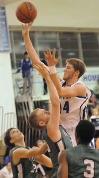 Quinton Motto puts up a shot in traffic. (Photo by Kevin Nagle)