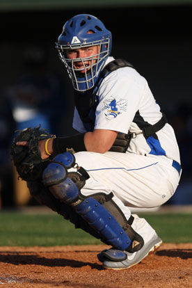 Hayden Lessenberry looks to the dugout for a pitch call. (Photo by Rick Nation)