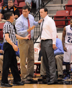 Bryant coaches Steve Wilson and Mike Abrahamson discuss a call with one of the officials. (Photo by Kevin Nagle)