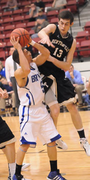 Jordan Griffin (5) is contested by Bentonville's David Frost. (Photo by Kevin Nagle)