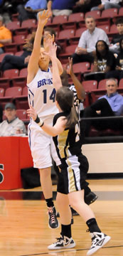 Peyton Weaver (14) launches a 3-point shot. (Photo by Kevin Nagle)