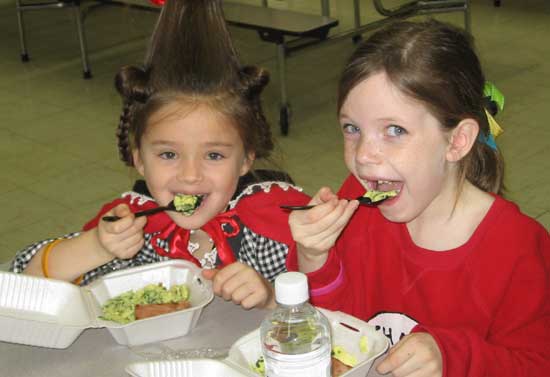 Taylor Moore and Jodi Bates enjoy some green eggs and ham from IHOP.