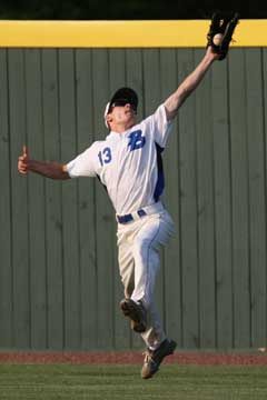 Right fielder Braden Jones leaps to make a catch on a sacrifice fly in the third inning of Tuesday's game. (Photo by Rick Nation)