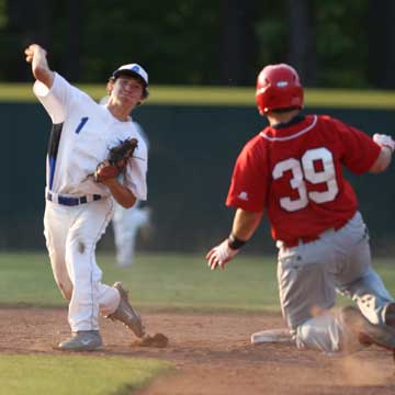 Ozzie Hurt (1) relays to first after forcing Cabot's Tristan Bulice. (Photo by Rick Nation)