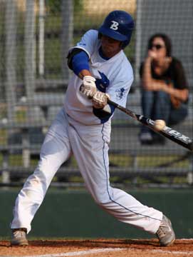 Tyler Nelson makes contact with his second-inning single to left. (Photo by Rick Nation)