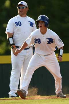 Drew Tipton leads off third under the watchful eye of third-base coach Elliott Jacobs. (Photo by Rick Nation)