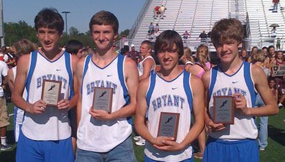 The winning 4 x 800 team of Austin Masters, Jim Dellorto, Connor Wilson, and Nick Schmidt.