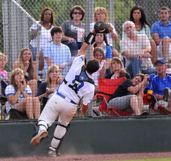 Bryant catcher Hayden Lessenberry catches a foul pop in front of the backstop to end a Van Buren threat Thursday. (Photo by Kevin Nagle)