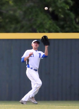 Tyler Nelson settles under a fly in left. (photo by Kevin Nagle)