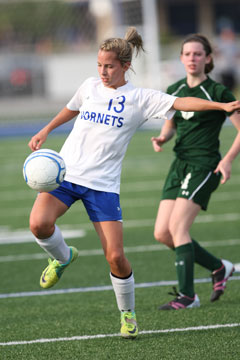 Bailey Gartrell (13) works to control the ball. (Photo by Rick Nation)